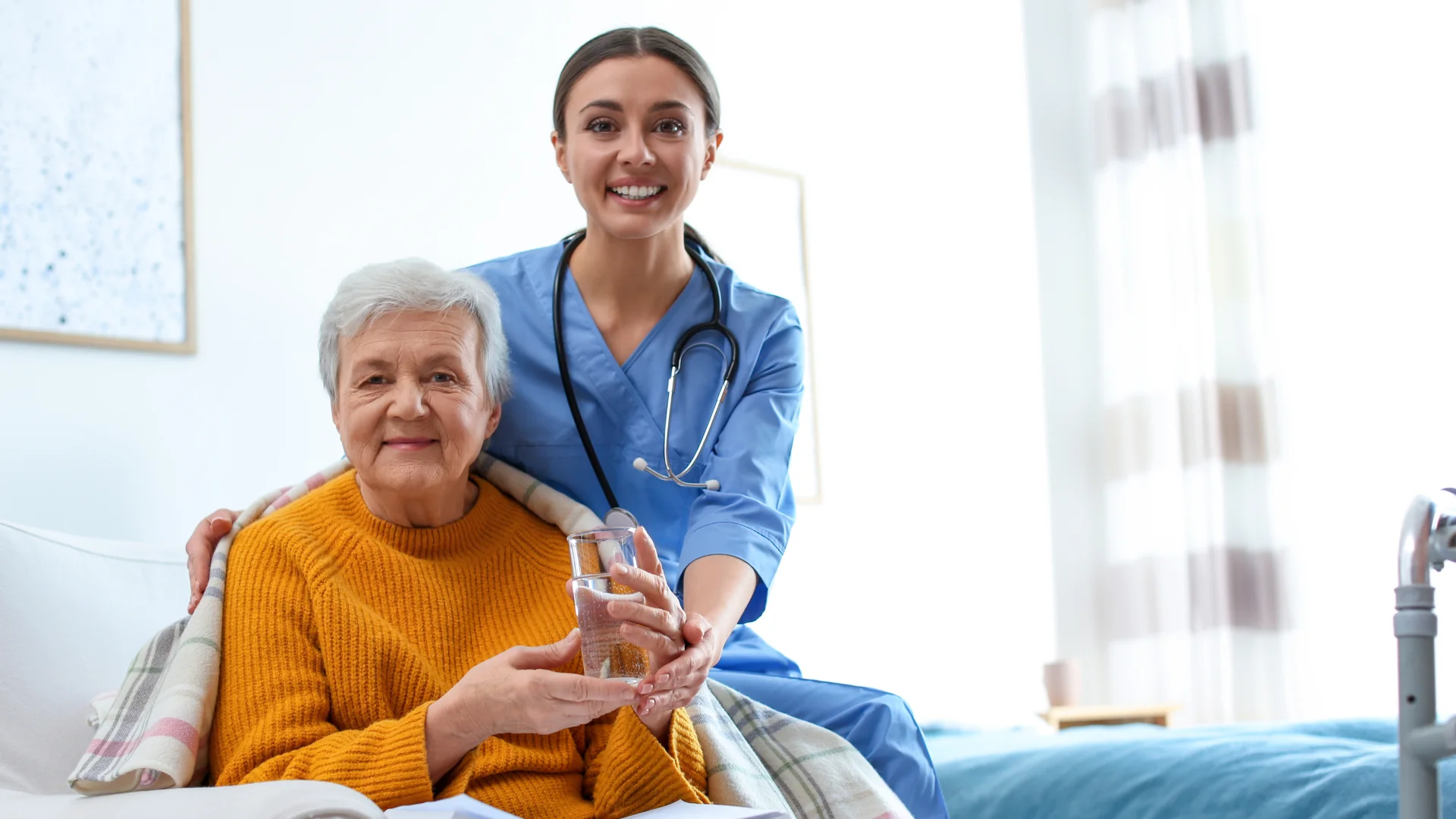 Domiciliary care in Clare: carer and older woman preparing lunch in a cottage kitchen